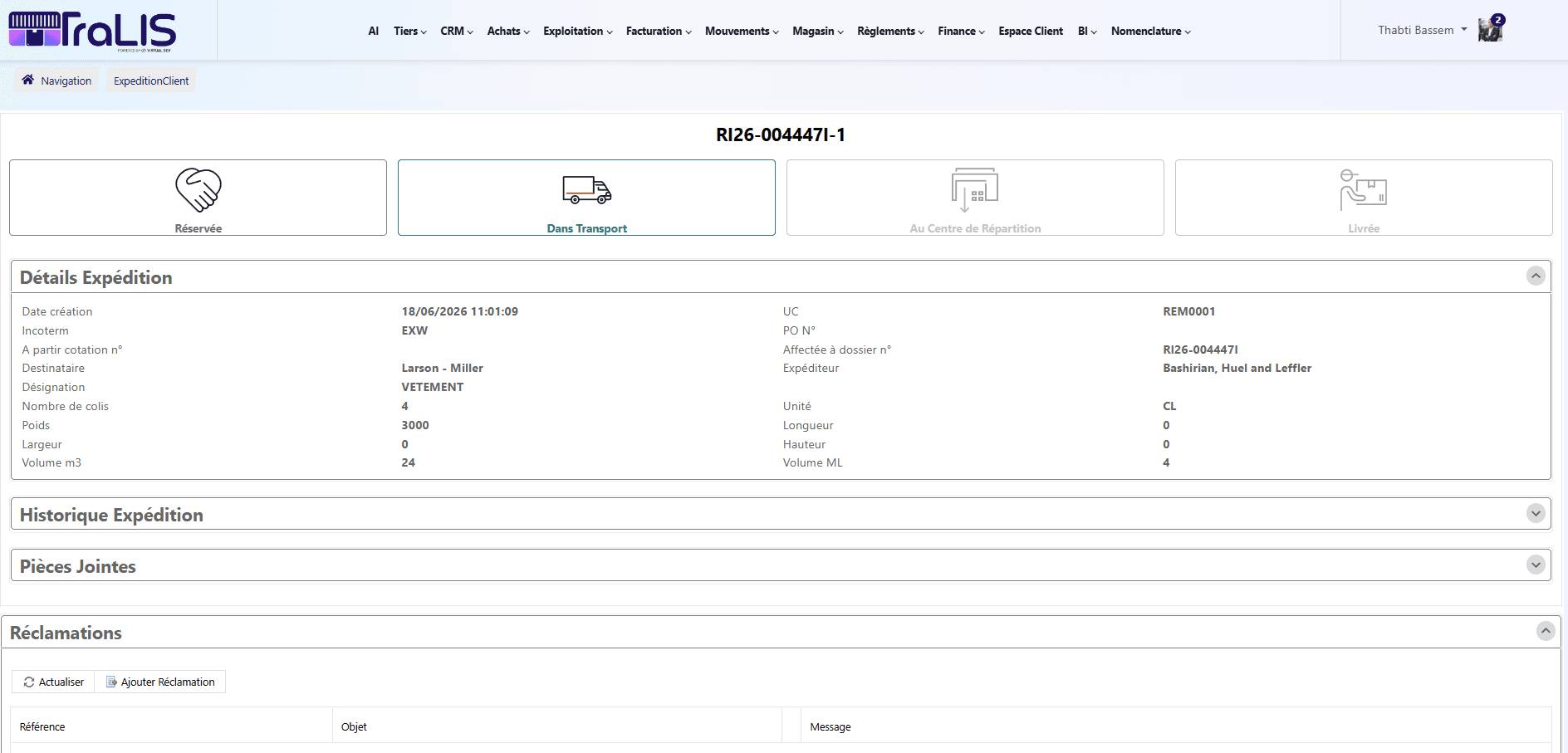 Client portal — real-time tracking of shipment RI26-004447I, status workflow (Booked → In Transit → At Distribution Center → Delivered), details, history, and claims
